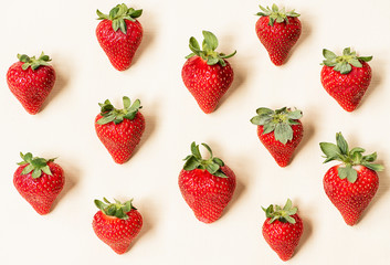 Strawberries on a light yellow background