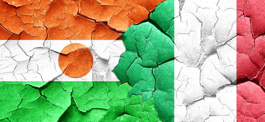 niger flag with Italy flag on a grunge cracked wall