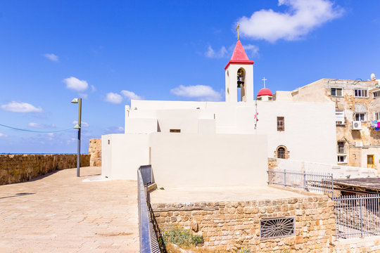 White Maronites house on the  fortress wall in the Old Acre 