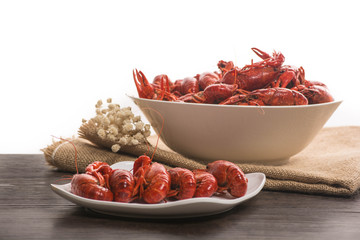 boiled big crawfish on the wooden surface