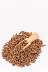 Obraz premium Pile of coffee beans over white background