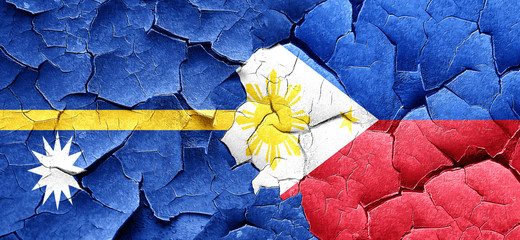 Nauru flag with Philippines flag on a grunge cracked wall