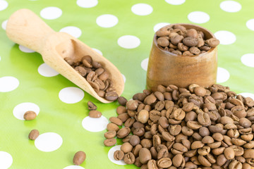 Roasted coffee beans in a pile on the table