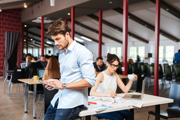 Businessman working and using tablet in office