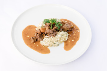 Rooster in red wine with cottage cheese-dill potatoes