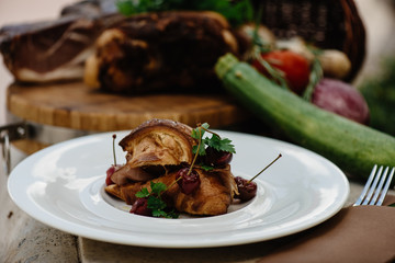 Home made ham with croissant and vinegar cherries