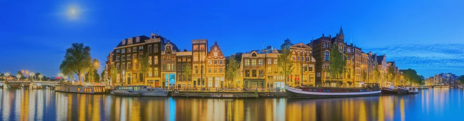 Fototapeten Amstel river, canals and night view of beautiful Amsterdam city. Netherlands © boule1301