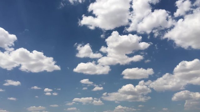 white clouds against blue sky