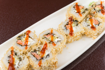 sushi rolls on white plate