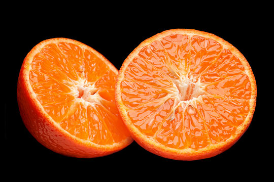 Orange fruit part on black