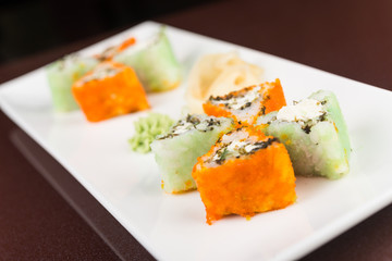 sushi rolls on white plate