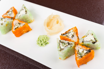 sushi rolls on white plate