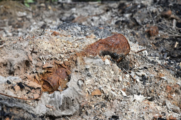 Burned metal containers at the landfill