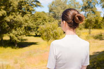 Woman Looking the Trees in the park