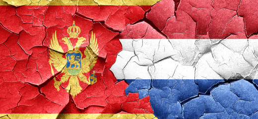 Montenegro flag with Netherlands flag on a grunge cracked wall