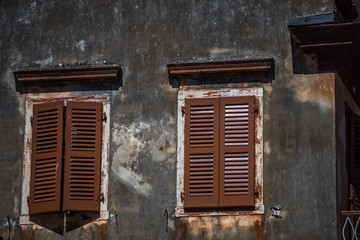 Old traditional brown greek windows, in Corfu, Greece
