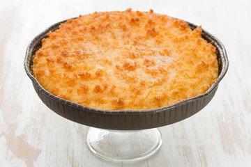 coconut tarte in white wooden background