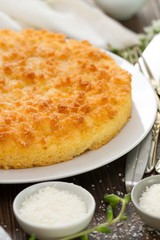 coconut tarte in brown wooden background with forks