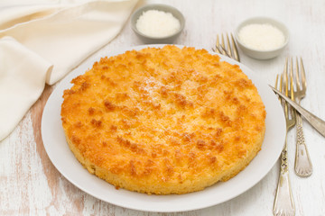 coconut tarte on white plate in white background