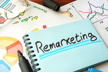 Remarketing written on a notepad sheet. Marketing concept.
