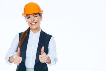Woman builder in business suit show thumb up.
