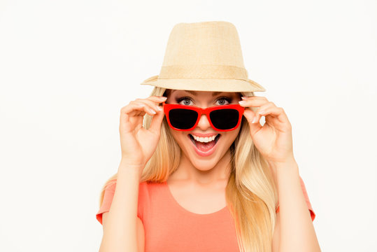 Portrait of happy cheerful woman in summer hat and spectacles