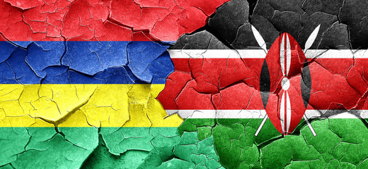 Mauritius flag with Kenya flag on a grunge cracked wall