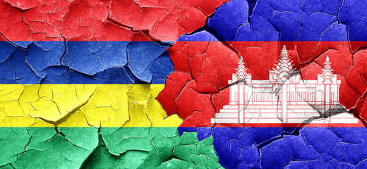 Mauritius flag with Cambodia flag on a grunge cracked wall