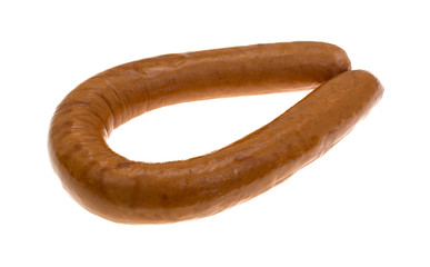 Reduced calorie kielbasa sausage isolated on a white background.
