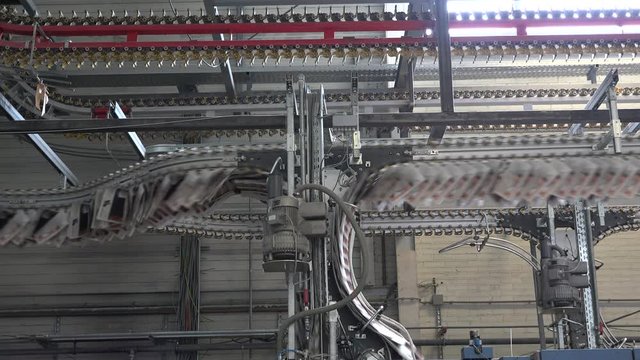 long chain moving in industrial printing press