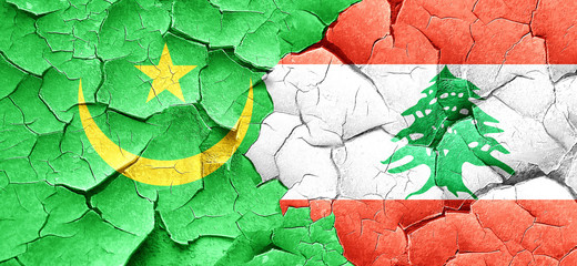 Mauritania flag with Lebanon flag on a grunge cracked wall