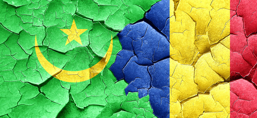 Mauritania flag with Romania flag on a grunge cracked wall