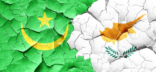 Mauritania flag with Cyprus flag on a grunge cracked wall