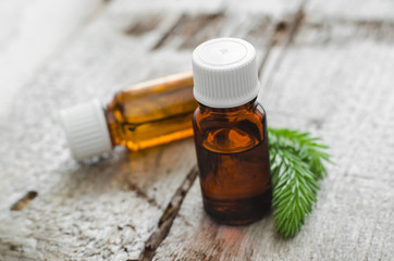Two small bottles of essential spruce (fir) oil