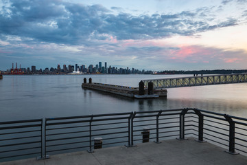 Beautiful cloudy sunset viewed at Lonsdale Quay, North Vancouver, British Columbia, Canada.