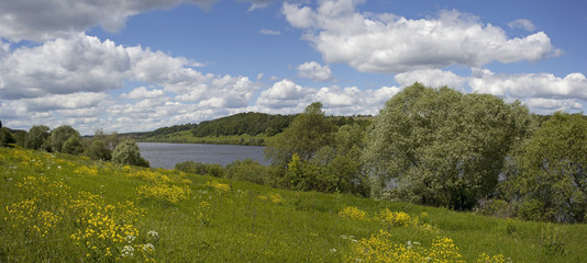 Panorama of the river with clouds.