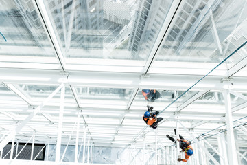 Workers cleaning windows of a skyscrapper in Dubai