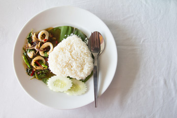 Thai spicy food, squid with basil, and heart shape rice