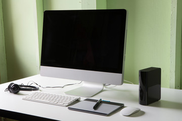 Business place of work with with computer monitor keyboard and m