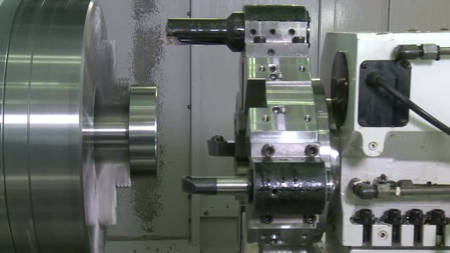 Metalworking CNC milling machine. Cutting metal modern processing technology.