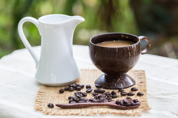 Coffee beans on the wooden floor.