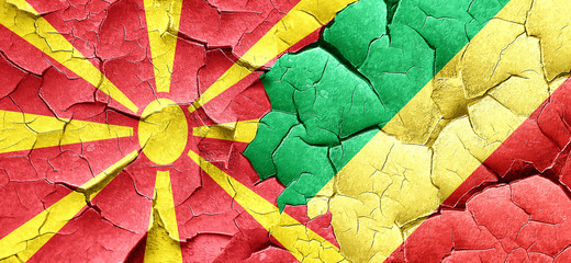 Macedonia flag with congo flag on a grunge cracked wall