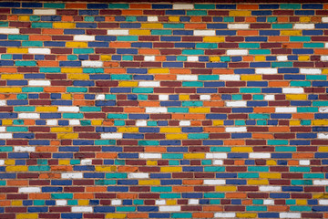 a wall of multicolored bricks.