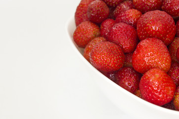 Ripe strawberry with copy space. Summer berries isolated on white background.