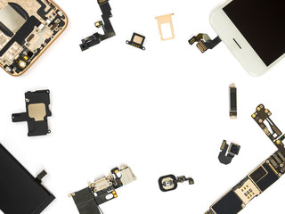 Flat Lay (Top view) of smart phone components isolate on white background with copy space © poravute