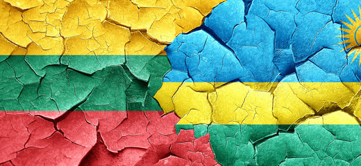 Lithuania flag with rwanda flag on a grunge cracked wall