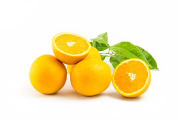 Fresh oranges isolated with leafs on white background