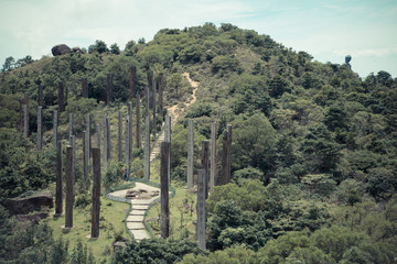 Fototapeta na wymiar Steles containing centuries old sutra along Wisdom path at the hills of Ngong Ping on Lantau Island,