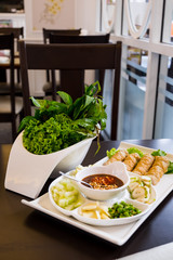 Grilled pork with vegetables and wrapping flour. Vietnamese styl