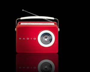 Red Retro Vintage Radio with reflection on black